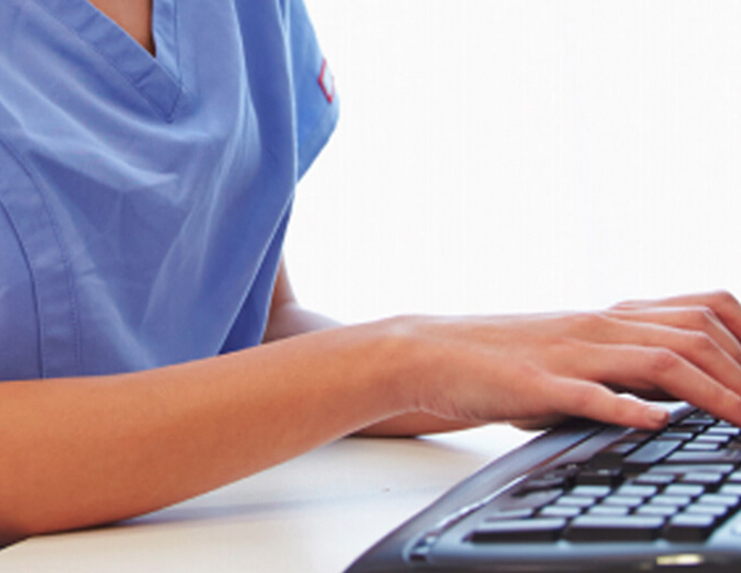 Health care worker working with Accutech's Access Control System